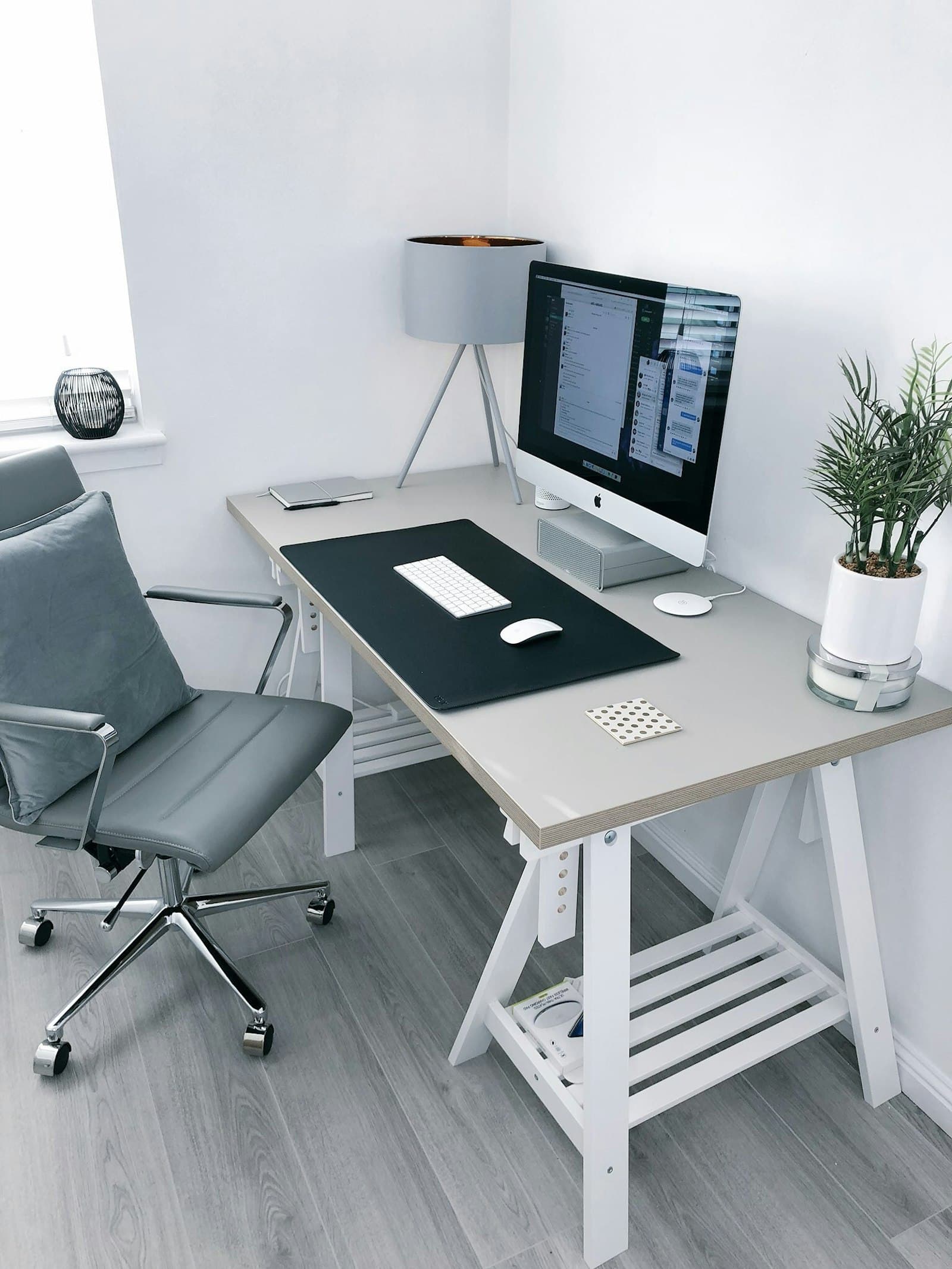 A LIGNOVA bamboo standing desk in a bright office